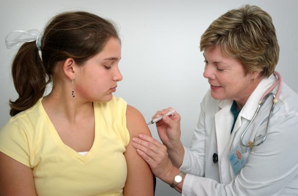 Girl getting vaccination
