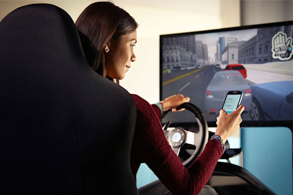 A woman in AT&T's It Can Wait texting-and-driving simulation