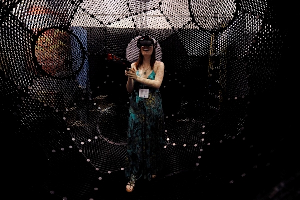 Woman using 360 Virtual Ventures' Virtusphere at E3 Media & Business Summit in L.A. June 15, 2010