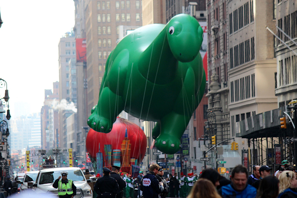 Macy's Thanksgiving Day parade (float above crowd)