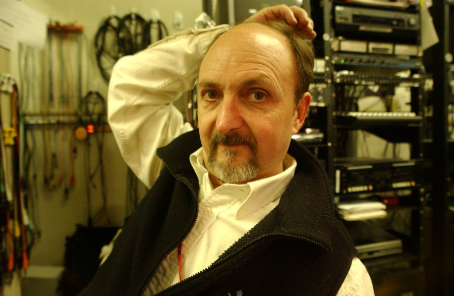 Frank Sauerwald, for many years the lynch pin and overall technical expert in Temple's School of Communications and Theater, is most at home surrounded by some of the tools with which he works his magic.