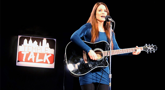 Audra Mclaughlin singing on the set of Temple Talk